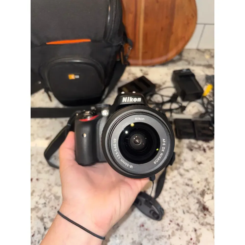 Nikon D5100 DSLR + 18-55mm VR Lens Kit, Case & Extra Batteries